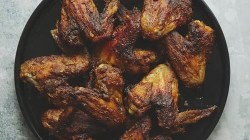 Golden Brown Chicken Wings on a Plate
