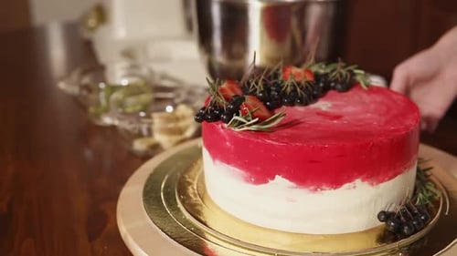 Delicious Decorated Cake Rotating on Table