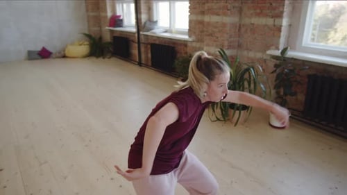 Female Dancer Practicing in Studio
