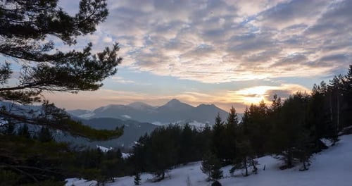 Sunset in the Winter Mountain Landscape in the Woods