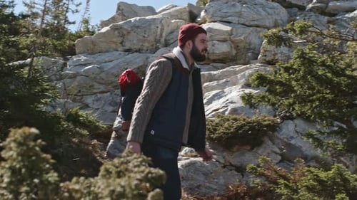 Young Man with Beard Hiking
