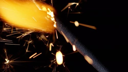 Close Up of Burning Sparkler with Sparks