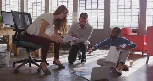 Young creative professionals working in a modern office