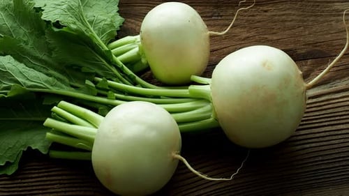 Fresh Turnips on a Rustic Wood Surface