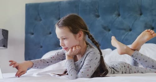 Happy girl using laptop 4k