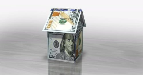 Dollar 100 USD money banknotes paper house on the table