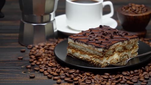 Tiramisu Cake Served with Coffee and Coffee Beans