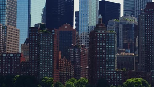 Modern High Rising Glass Buildings of Manhattan with Reflections on Windows