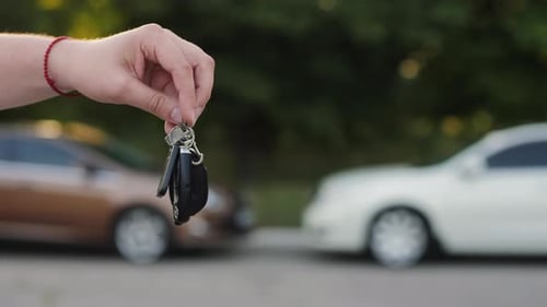 Male Hand with a Car Key