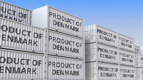 Containers with PRODUCT OF DENMARK Text in a Container Terminal