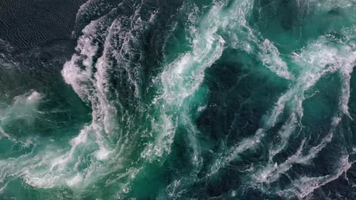 Waves of Water of the River and the Sea Meet Each Other During High Tide and Low Tide