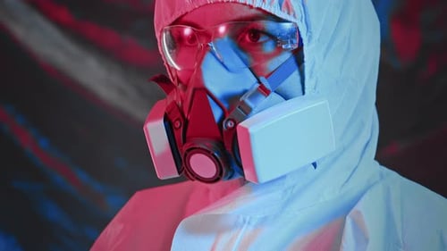 Person in Hazmat Suit with Respirator, Close Up