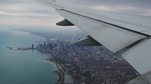 Wing of the Plane and Clouds View From the Plane