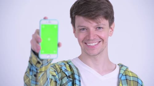 Man Holds Mobile Phone with Green Screen