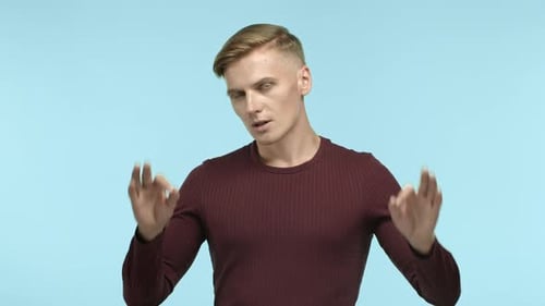 Young Adult Man Gives Ok Sign