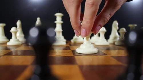 Moving Pawn During Intense Chess Game