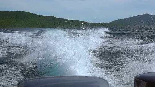 Boat Wake of Crashing Waves in Tropical Sea