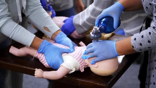 CPR Training on Infant Training Doll