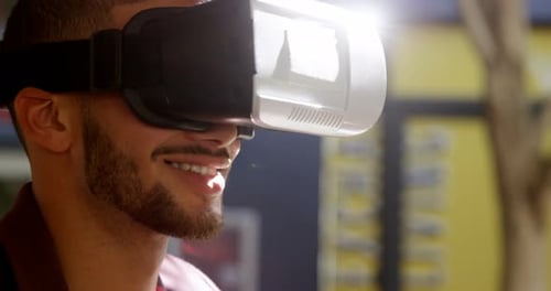 Young Adult Using VR Headset Outdoors