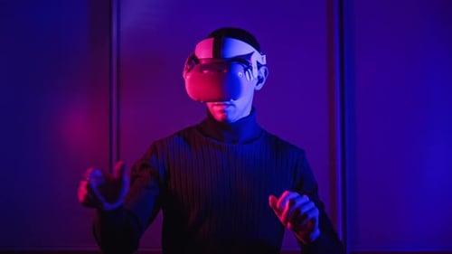 Young Adult Man Wearing Virtual Reality Headset