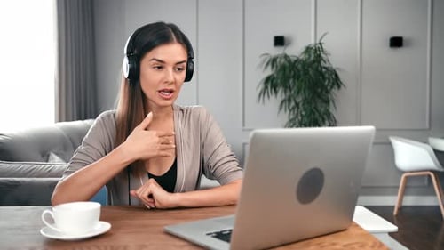Young Woman on Video Call at Home