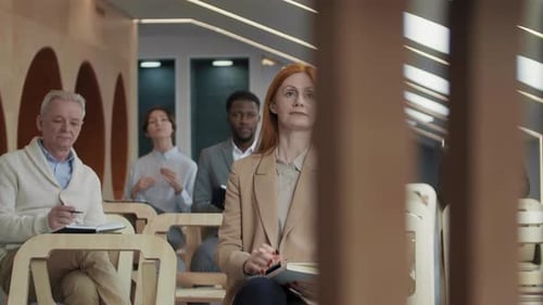 Diverse Group Attending Business Meeting