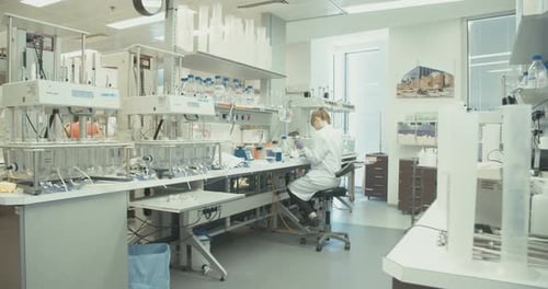 Woman Working in Modern Science Lab