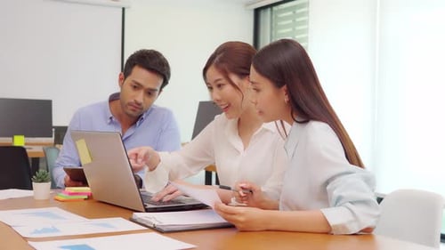 Group of young Startup coworkers working together to get ideas and marketing at office