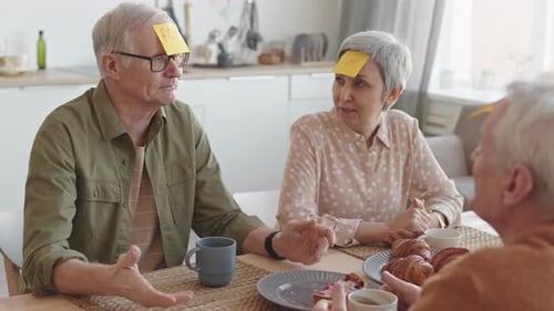 Older Man Winning Post-It Note Game