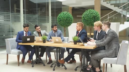 Business Meeting and Collaboration at Modern Office