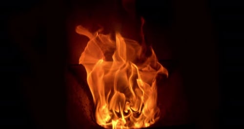 Flames in a pellet stove, Slow motion 4K
