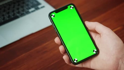 Businessman Using Smartphone with Chroma Key Closeup