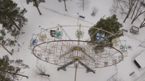 Aerial View of a Ferris Wheel in Winter