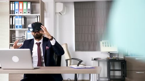 Professional Man Using VR Headset in Modern Office