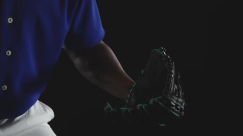 Close Up of Baseball Player Holding Glove