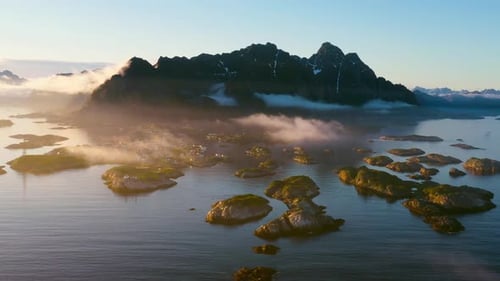 Misty Mountain and Town at Sunrise