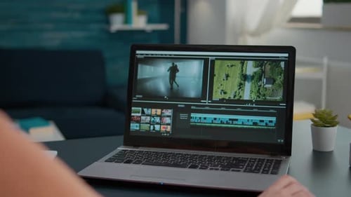 Design Student Working on Video Editing Software to Make Montage
