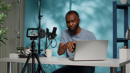 Young Adult Recording a Video About VR Headset