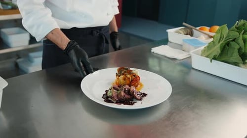 Filet mignon and ratatouille on a plate serving a dish in a restaurant