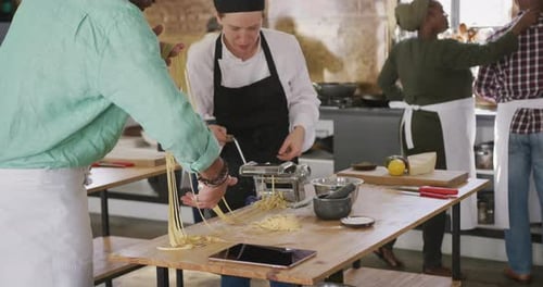 Chefs making pasta together