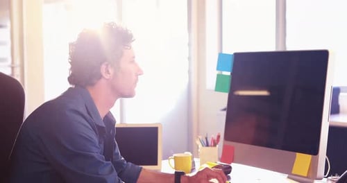 Creative Adult Working on a Graphics Tablet