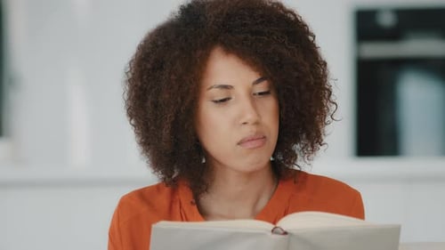 African American Student Girl with Curly Hair Learning Education Reading Textbook Preparing for