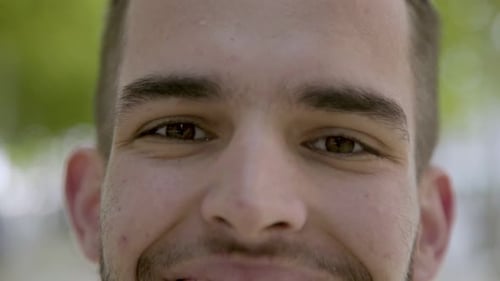 Smiling Young Man Close Up Face