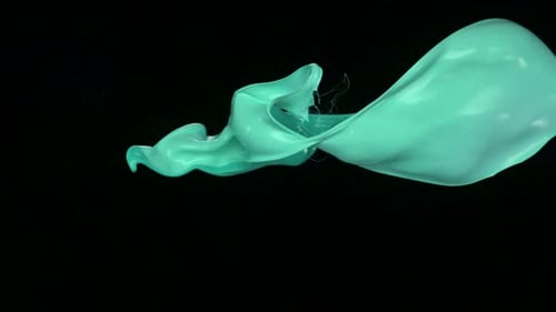 Green paint splash in the air, Slow Motion