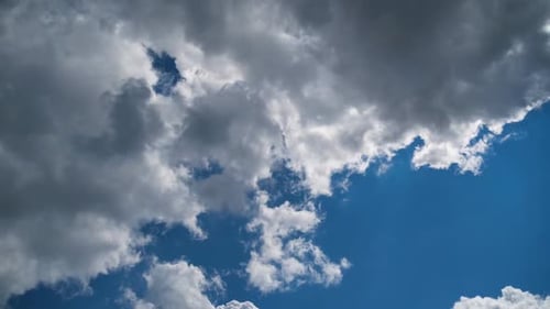 Clouds Drifting in a Blue Sky on a Sunny Day