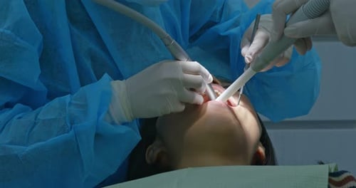 Woman undergo dental check up in clinic