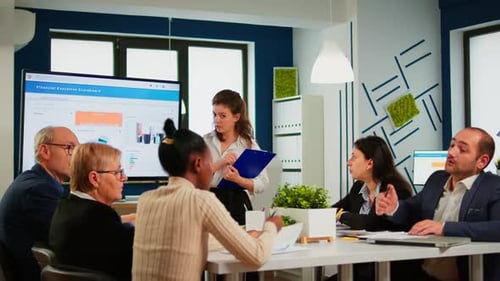 Business Presentation in Modern Corporate Office Meeting