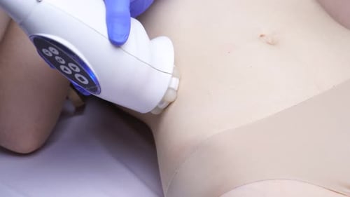 Woman Receives a Hardware Dermotonia Procedure at a Cosmetology Clinic.