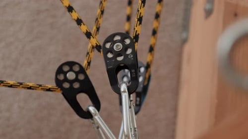Close Up of Black Pulleys and Ropes