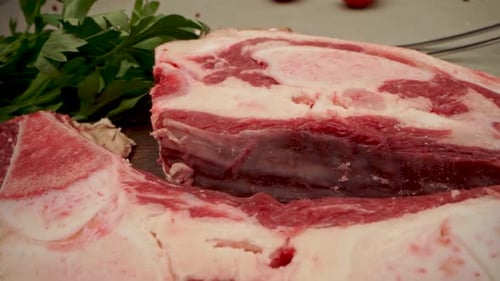 Raw Beef Fillet Meat on Wooden Board Close Up